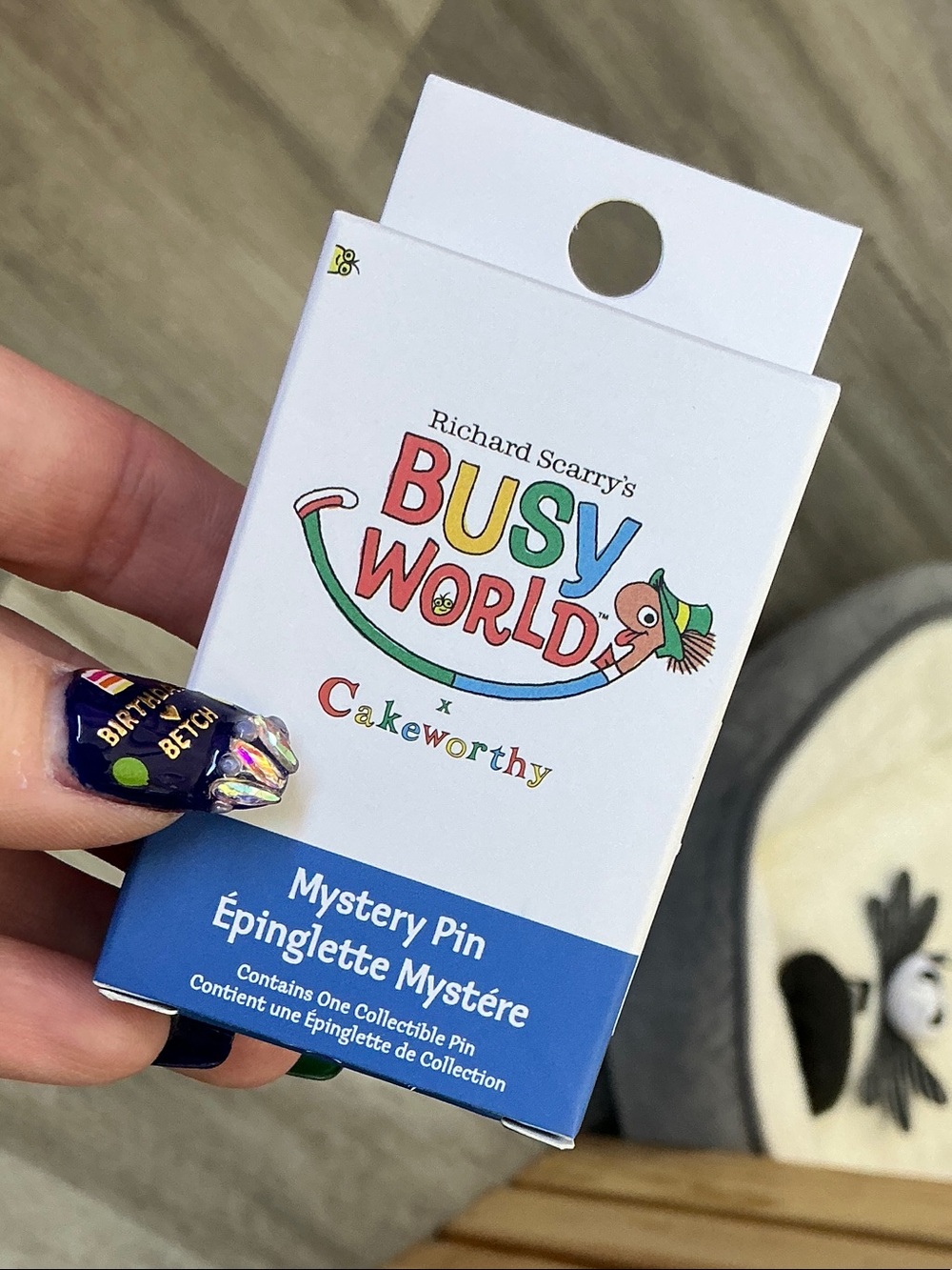 Richard Scarry's Busy World x Cakeworthy Mystery Pin - White & Blue Packaging